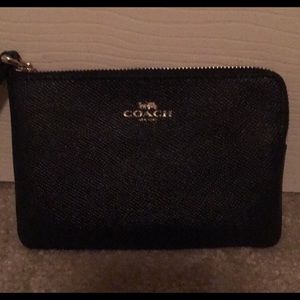 Coach black leather wristlet with gold detail